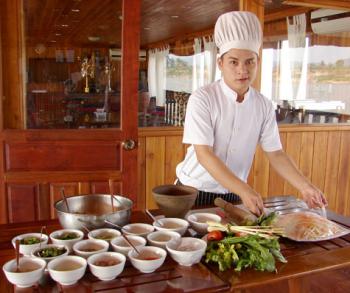 Chef Ning preparing for the cooking demonstration aboard the ship. Photos by Sandra Scott